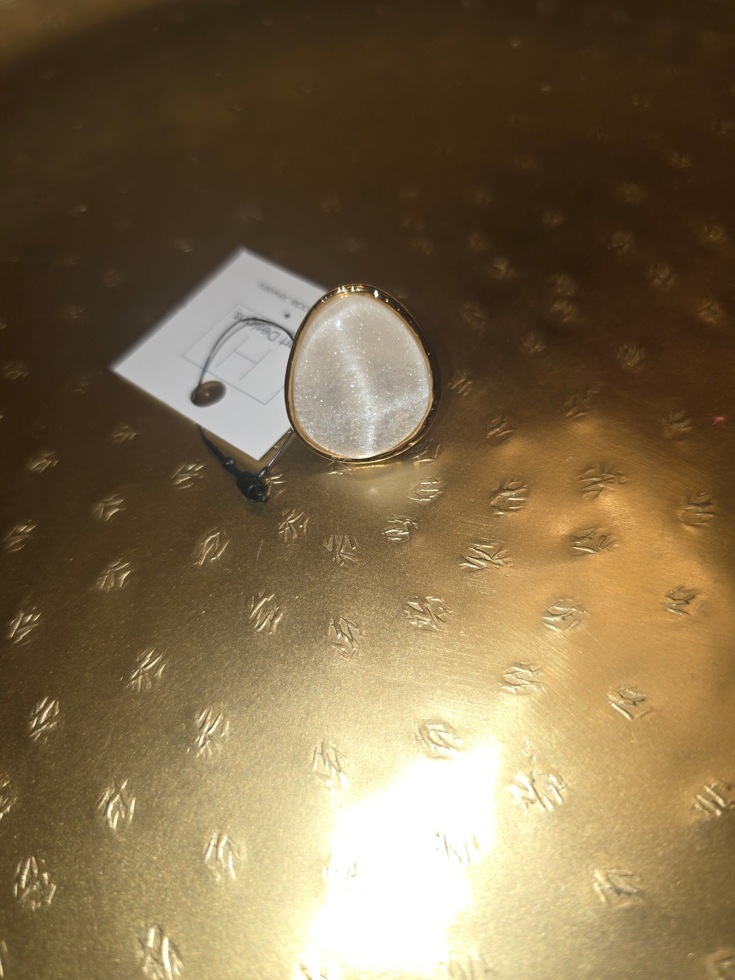 Tear drop adjustable ring
