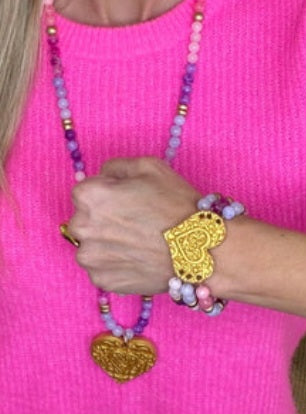 Pink and purple triple strand heart bracelet
