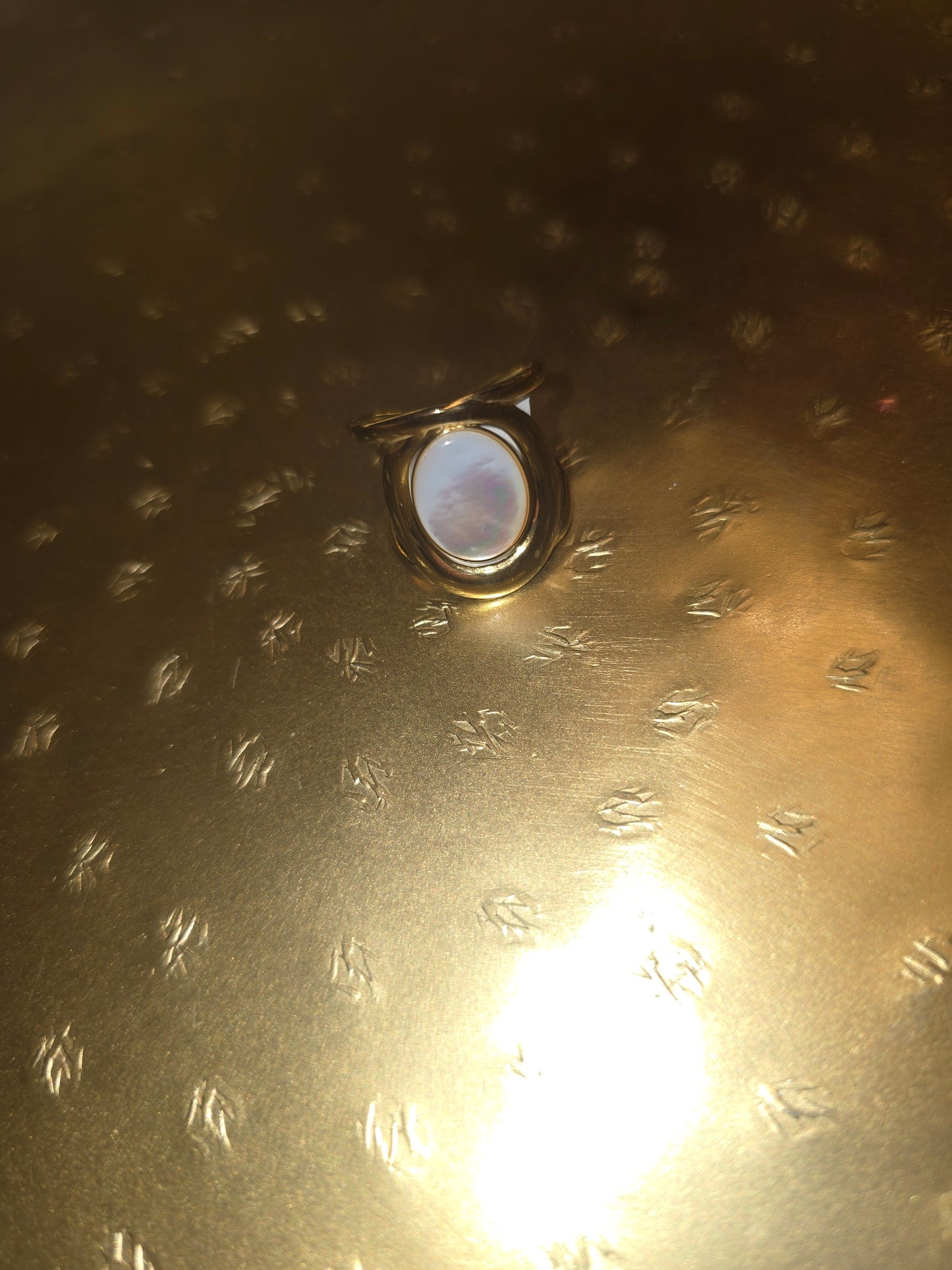 White iridescent oval adjustable ring