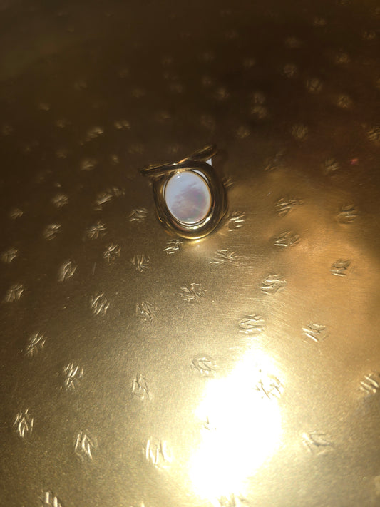 White iridescent oval adjustable ring