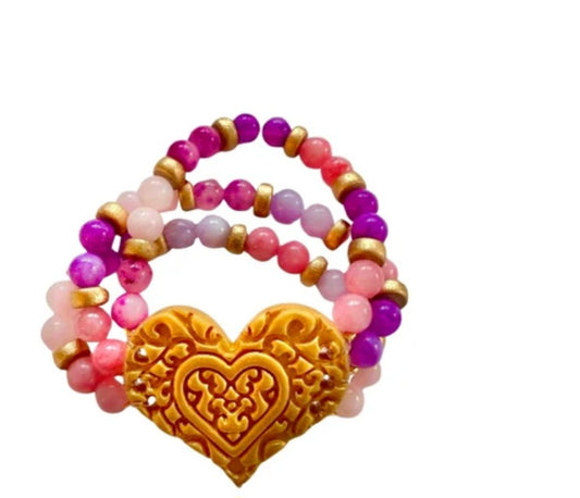 Pink and purple triple strand heart bracelet